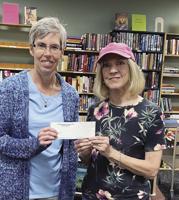 Friends group gives $25K to support library programs