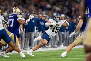 Aggies can’t keep up with Huskies