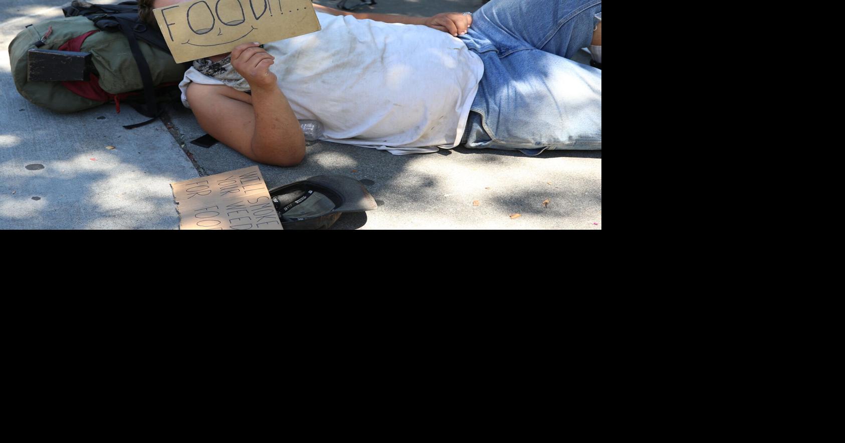 Spotlight on panhandlers mirrors rise in homelessness | News ...