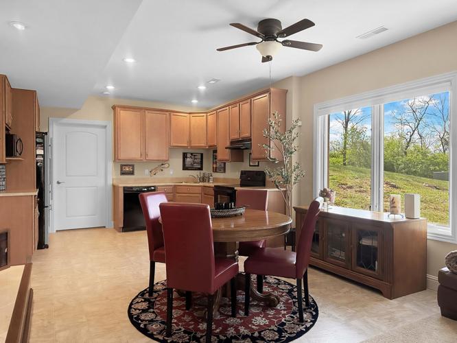 $1.195M Urbana home for sale has stacked-stone fireplace, inground pool ...