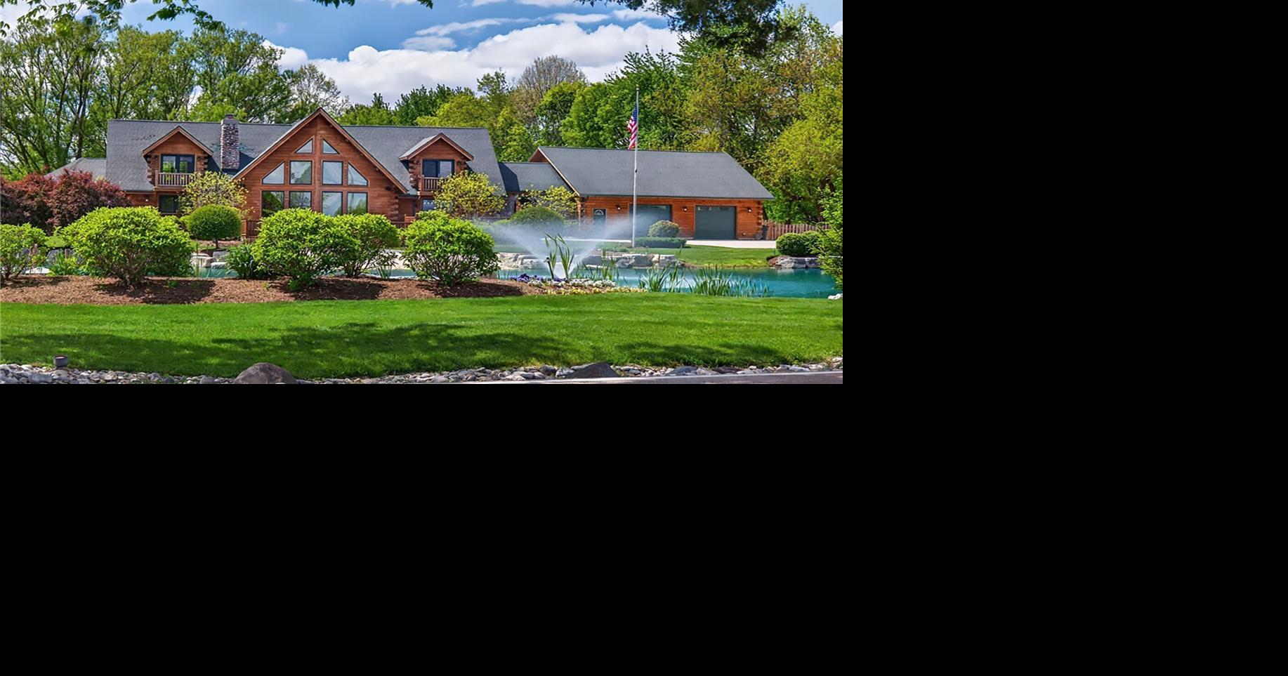 Iconic ‘Christmas House' log cabin in Tipp City on market for $1.875M