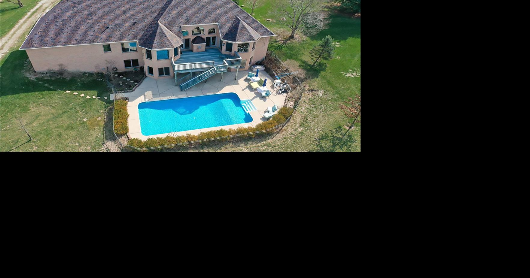 $1.3M Clearcreek Twp. ranch property has equestrian facility with fenced pastures