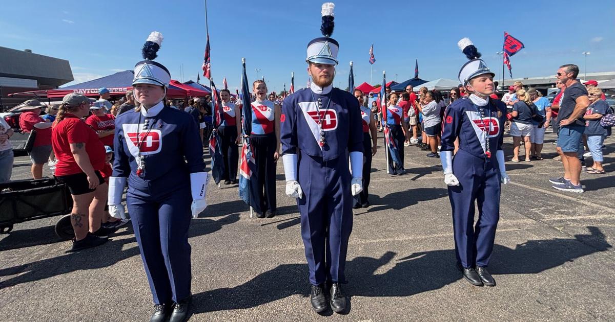 Dayton band walks to Welcome Stadium