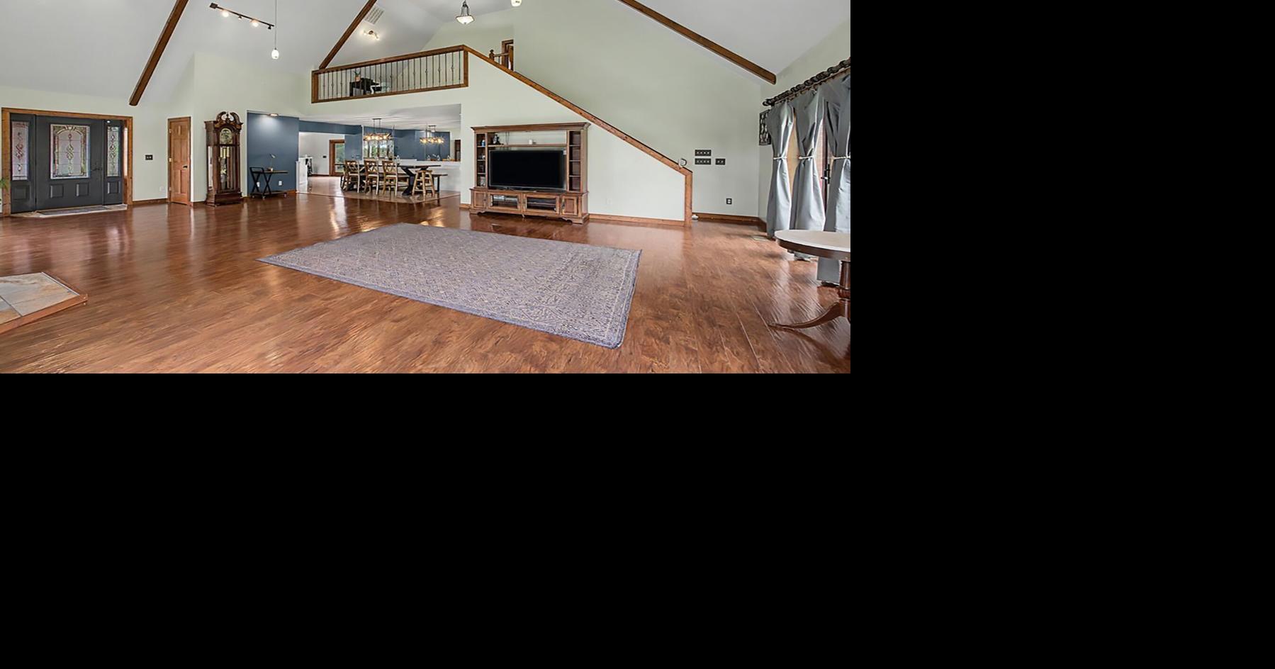 $1.299M German Twp. estate home for sale is on nearly 14 acres with a pond and barn