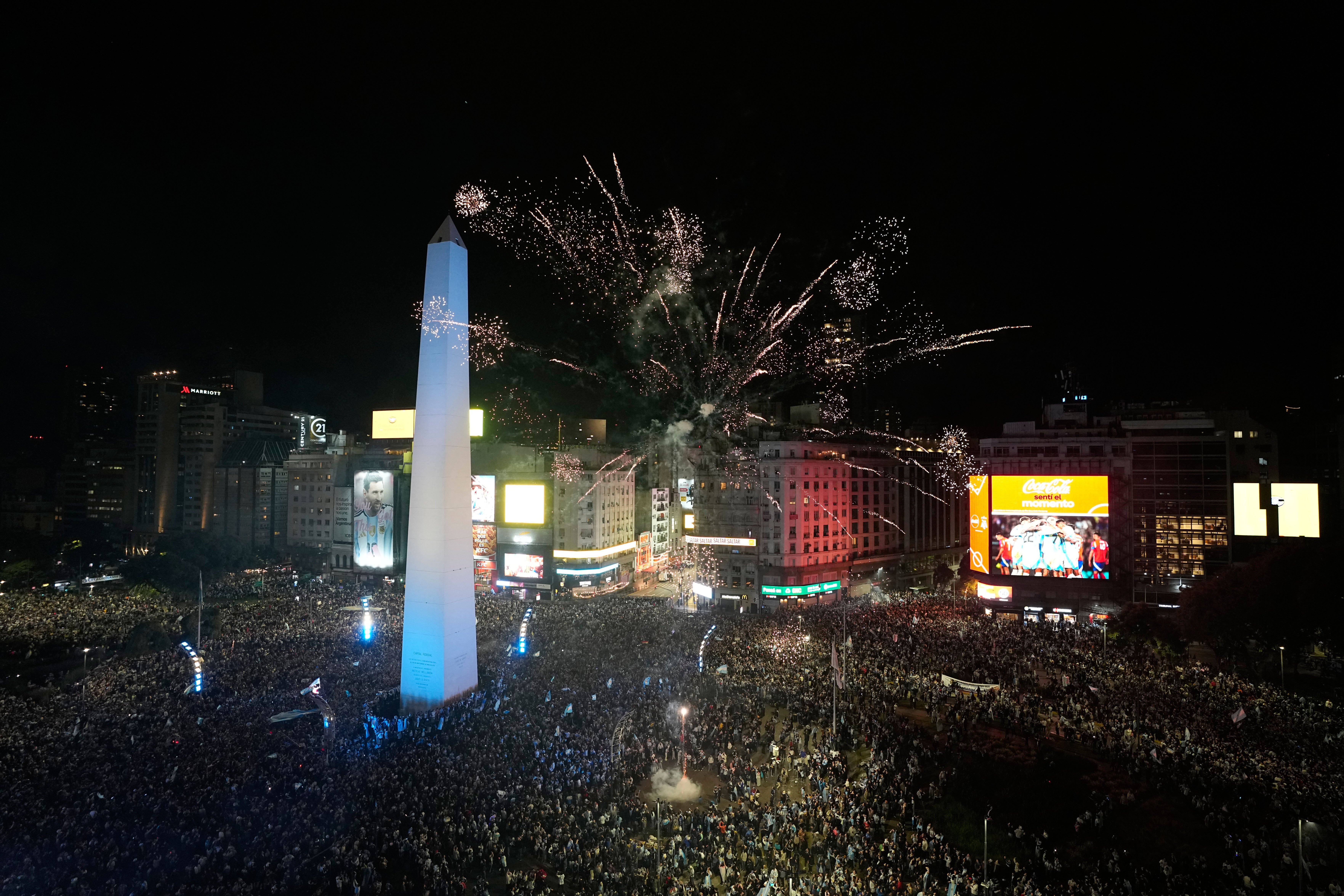 Tens of thousands of Argentine soccer fans celebrate their team's