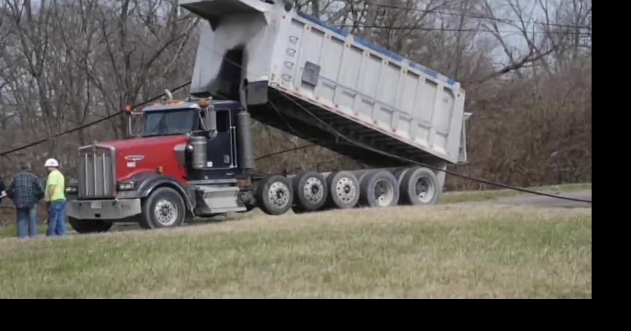 Dump truck pulls down utility lines on Jerome Avenue in Dayton | Local ...