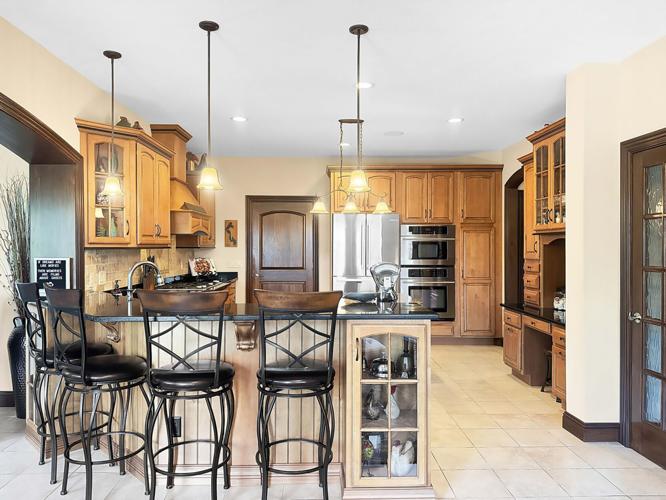 $1.195M Urbana home for sale has stacked-stone fireplace, inground pool ...