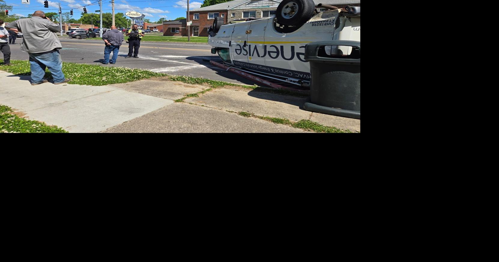 No injuries reported after van flips onto its top in Dayton crash