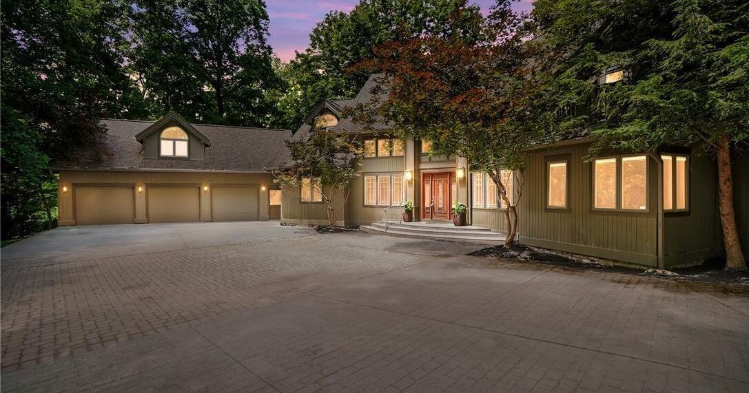 $1.095M Spring Valley Twp. home for sale is on 9-acre wooded lot, has river views