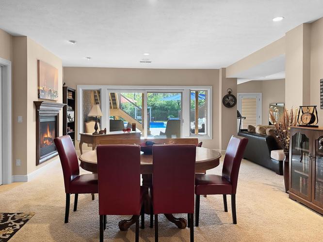 $1.195M Urbana home for sale has stacked-stone fireplace, inground pool ...