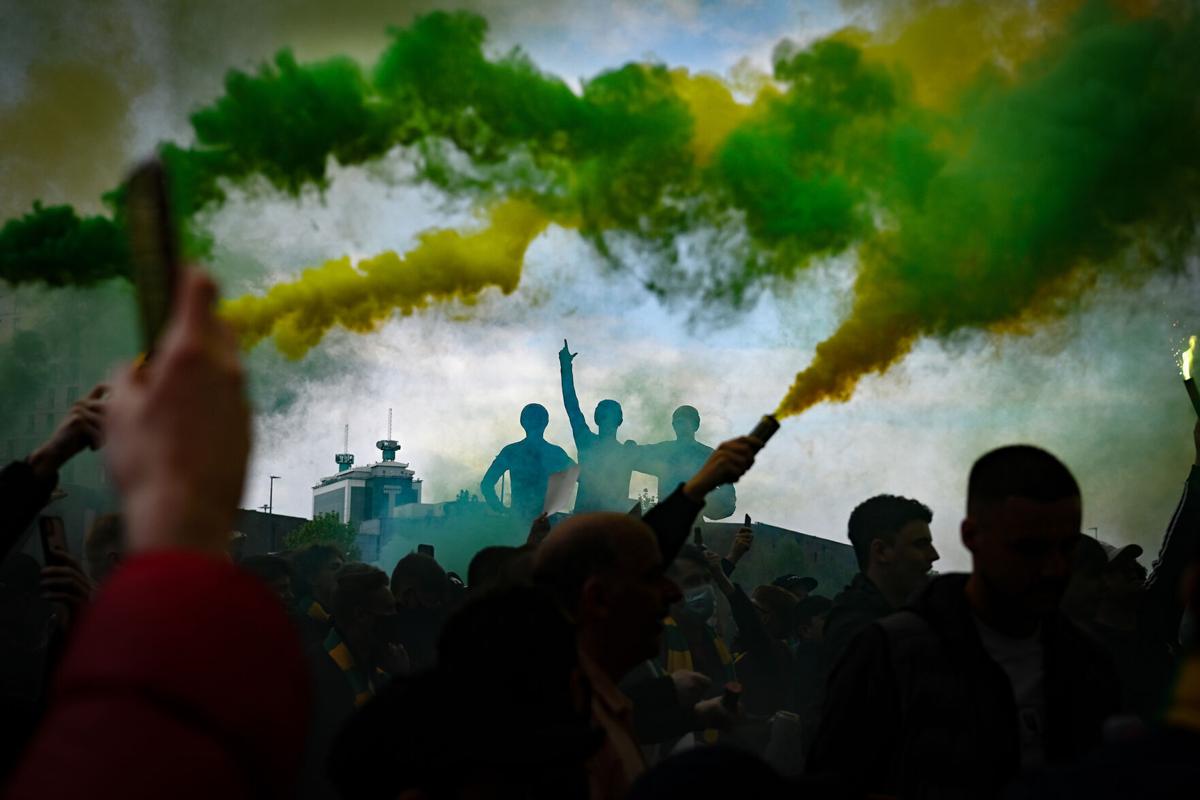 The United Trinity statue is seen as fans protest Manchester United's Glazer ownership outside the stadium prior to the Premier League match between Manchester United and Liverpool at Old Trafford on May 2, 2021 in Manchester, England.