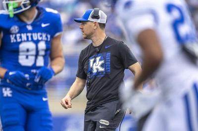 Under the new SEC football scheduling format, Kentucky and new Wildcats head coach Will Stein, middle, will have only four annual opponents-- Florida, South Carolina, Tennessee and Louisville.