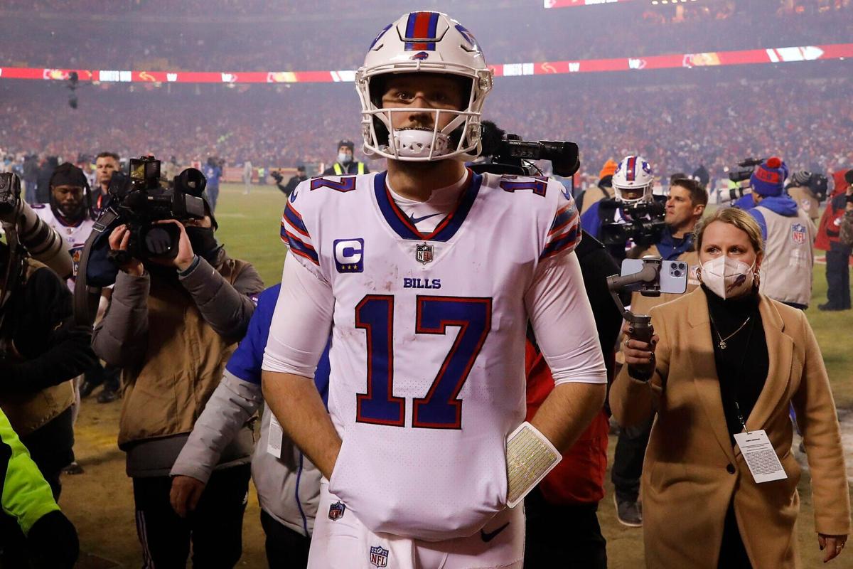 Buffalo Bills quarterback Josh Allen walks off the field after a 42-36 loss against the Kansas City Chiefs in the AFC Divisional Playoff game at Arrowhead Stadium on Jan. 23, 2022, in Kansas City, Missouri.