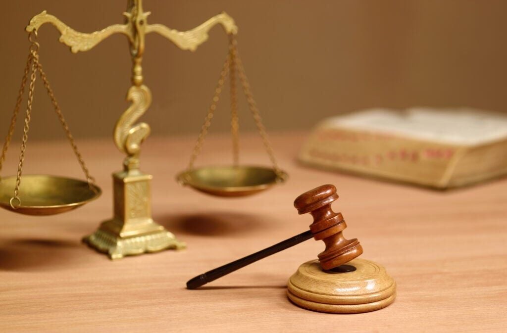 Lawsuit: Iowa worker stranded in Canada for a year due to visa-related delays