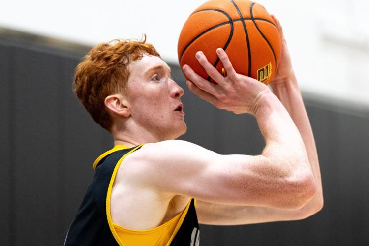 Iowa guard Ethan Harris shoots the ball during a summer basketball practice July 8, 2026 at Carver-Hawkeye Arena in Iowa City,