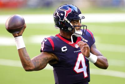 Deshaun Watson #4 of the Houston Texans in action against the Tennessee Titans during a game at NRG Stadium on Jan. 3, 2021 in Houston, Texas.