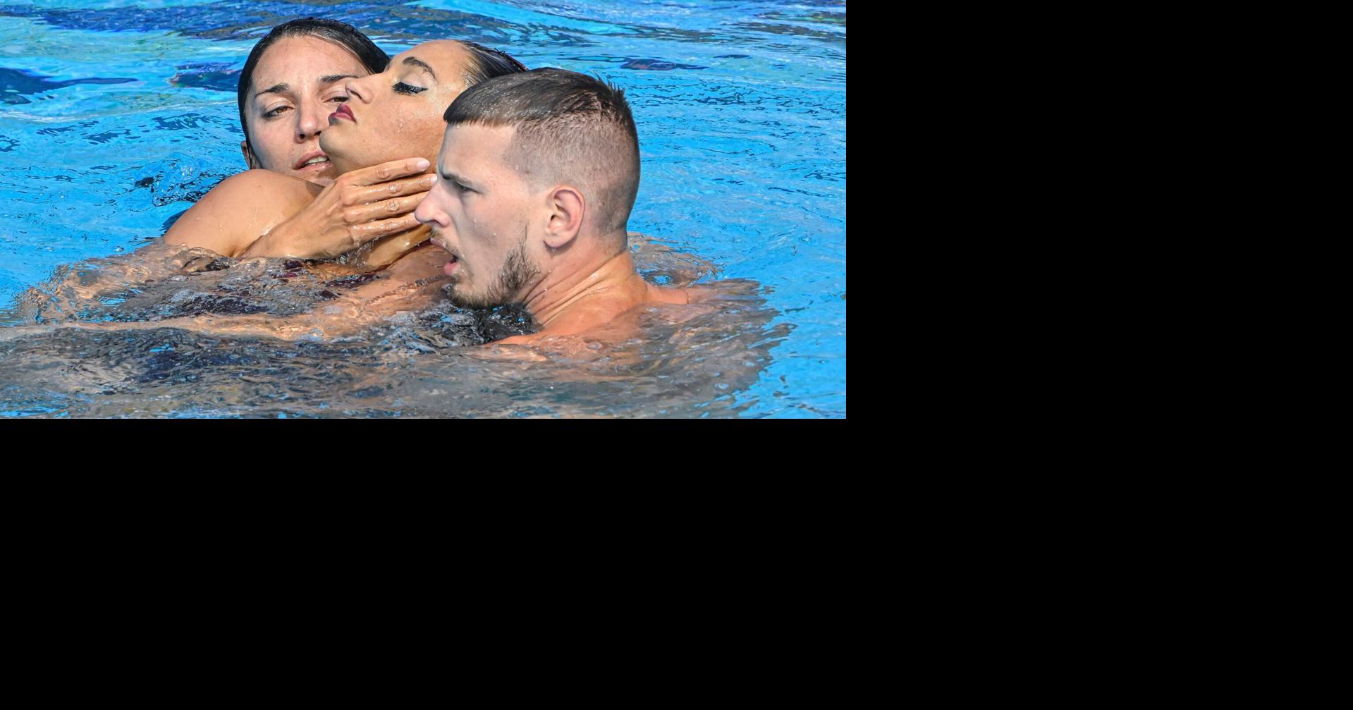 US coach makes dramatic rescue of artistic swimmer at worlds