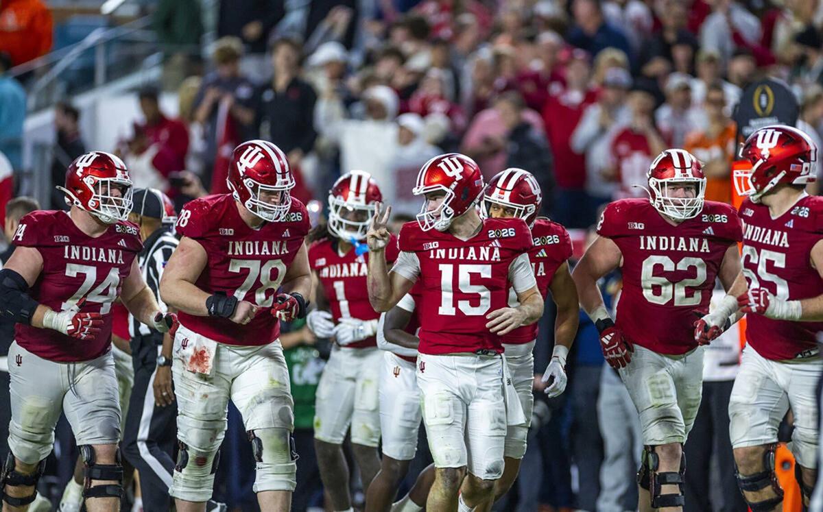 Indiana quarterback Fernando Mendoza lets teammates know a few kneel downs and they defeat the University of Miami during the second half of the College Football Playoff national championship game at Hard Rock Stadium on Jan. 19, 2026, in Miami Gardens,...