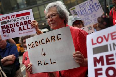 FILE PHOTO: Rally on the 61st Anniversary of Medicare and Medicaid, in New York City