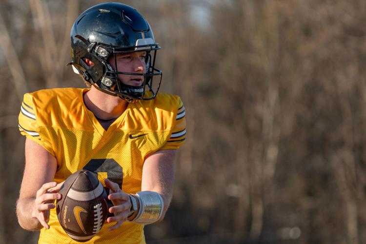 Iowa quarterback Hank Brown (9) runs a drill during practice April 9, 2026 in Iowa City, Iowa.