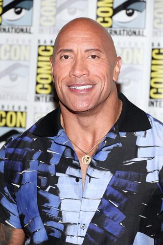In this photo from July 23, 2022, Dwayne Johnson speaks onstage at the Warner Bros. theatrical session with "Black Adam" and "Shazam: Fury of the Gods" panel during 2022 Comic-Con International: San Diego at San Diego Convention Center in San Diego, Cal...