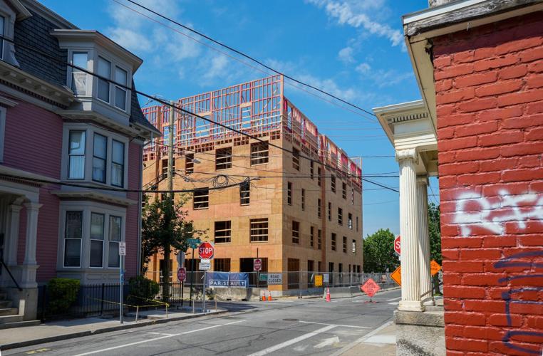 Work continues at Crossroads RI's affordable housing complex at 371 Pine St. in Providence in mid-May.