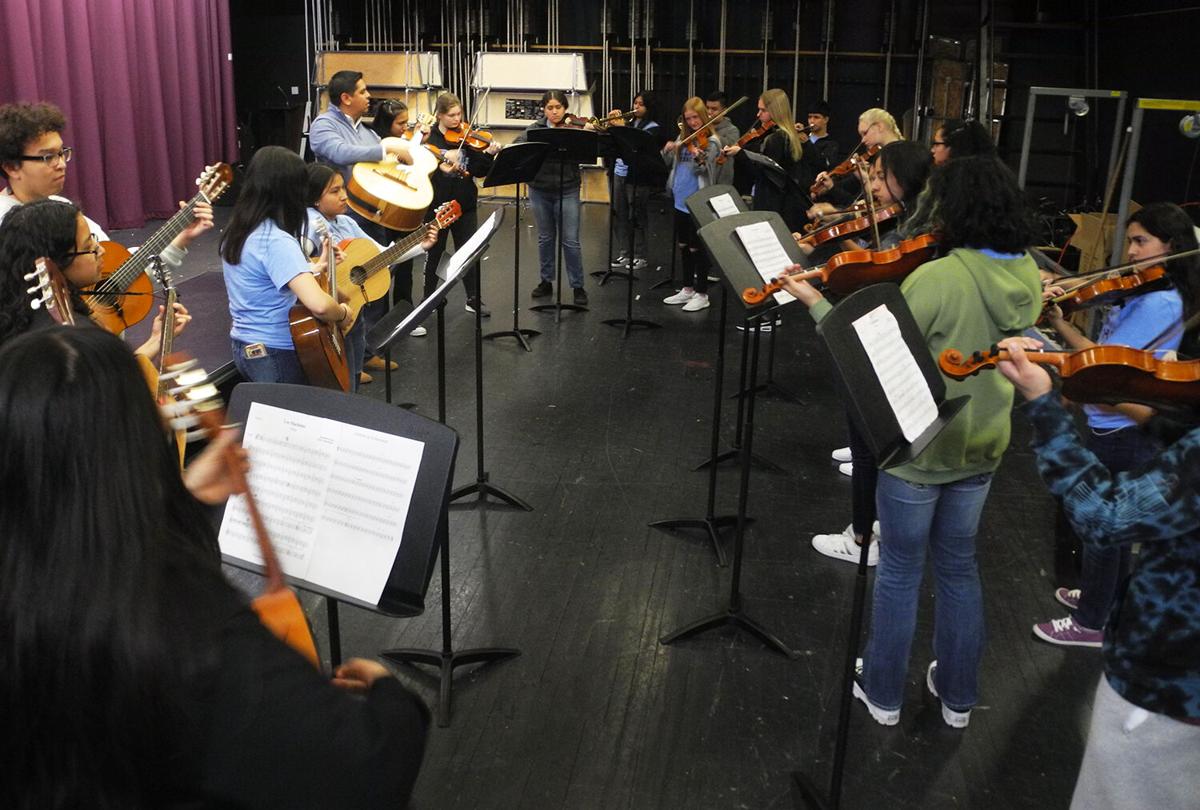 Mariachi practice with 9-10 group