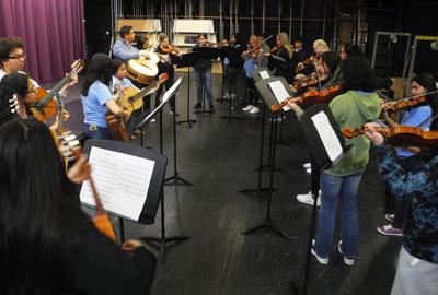 Mariachi practice with 9-10 group
