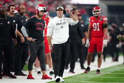 Utah football coach Morgan Scalley watches from the sidelines during his team's game against Nebraska during the 2026 SRS Distribution Las Vegas Bowl at Allegiant Stadium.