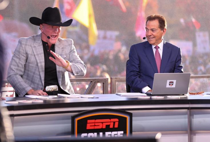 ESPN personality Pat McAfee talks during College GameDay with Nick Saban looking on Saturday, Nov. 8, 2025 at Jones AT&T Stadium in Lubbock, Texas.