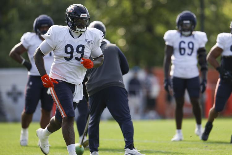 Bears defensive tackle Gervon Dexter Sr. (99) participates in training camp at Halas Hall on Aug. 4, 2026.
