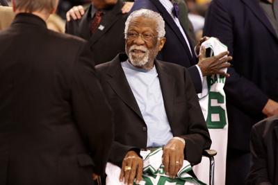 In this file photo, member of the Boston Celtics' 1966 Championship team Bill Russell is honored at halftime of a game between the Boston Celtics and the Miami Heat at TD Garden on April 13, 2016, in Boston.