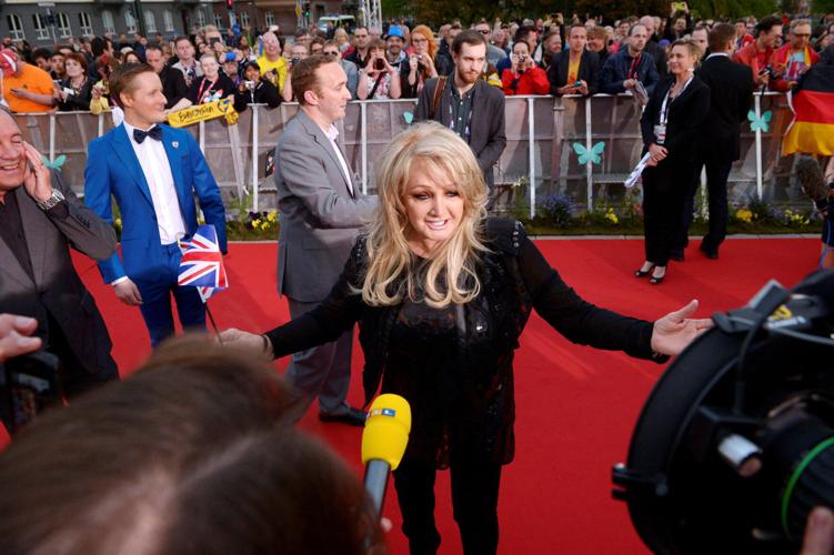 FILE PHOTO: Britain's Tyler, who shall compete with the song "believe in me", gestures on the red carpet during the opening party for the Eurovision Song Contest at the Opera Hall in Malmo