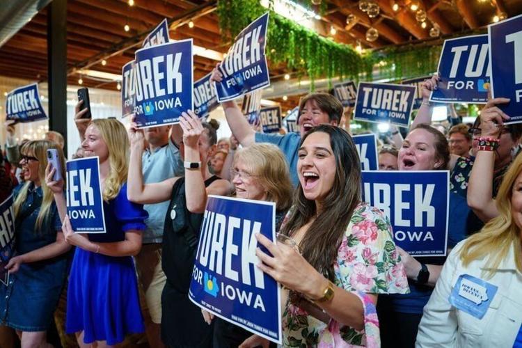 Supporters cheer as Iowa state Rep. Josh Turek speaks during a primary election night watch party after winning the Democratic nomination for U.S. Senate, Tuesday, June 2, 2026, in Des Moines.