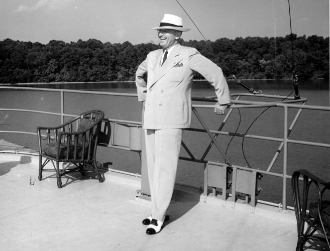 This photograph is of President Harry S. Truman on the flying bridge of the USS Williamsburg as it sails up the Potomac River on September 2, 1946.