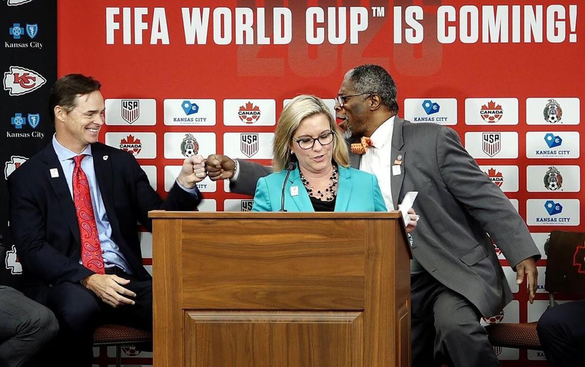 This summer's 2026 World Cup will be played at select sites across North America thanks to a joint bid between the U.S., Canada and Mexico. Pictured here, on June 13, 2018, then-Kansas City mayor Sly James, right, fist-bumps Kansas City Chiefs president...