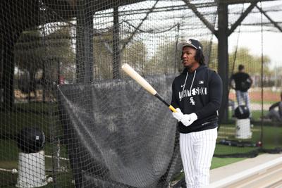 Chicago White Sox players Luisangel Acuña stands outside the batting cages during Spring Training at Camelback Ranch–Glendale in Phoenix, Ariz., on Monday, Feb. 16, 2026.