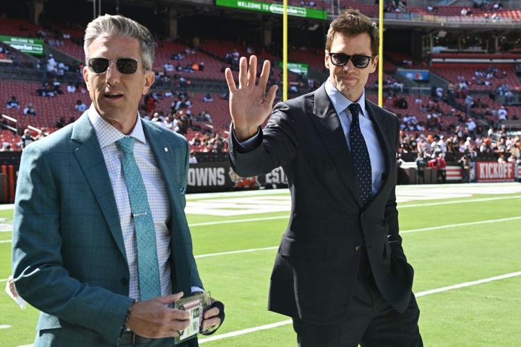 FOX Sports broadcaster Tom Brady greets fans before the game between the Cleveland Browns and the Dallas Cowboys at Huntington Bank Field in Cleveland.