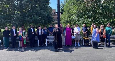 Jessica Margrave Schirm, senior pastor at the Grinnell United Church of Christ, speaks at a meeting of faith leaders across the state to call for voting rights protections at Cowles Commons in Des Moines on July 7, 2026.