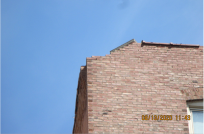 August 2020 west wall picture city inspection 2.PNG