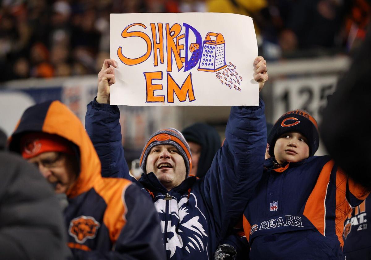 A Chicago Bears fan cheers against the Green Bay Packers in the second quarter of an NFC wild card game at Soldier Field in Chicago on Saturday, Jan. 10, 2026.