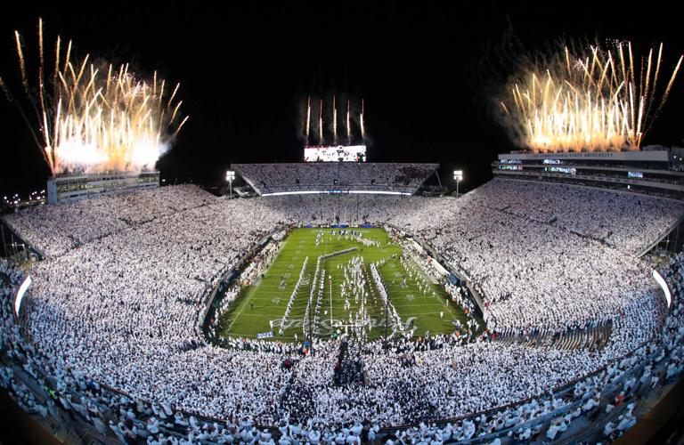 Fireworks burst overhead as Penn State take the field prior to its White Out game against Washington at Beaver Stadium on Nov. 9, 2024.