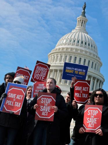 FILE PHOTO: Senate Democrats speak to gathering opposed to the SAVE America legislation at the U.S. Capitol in Washington