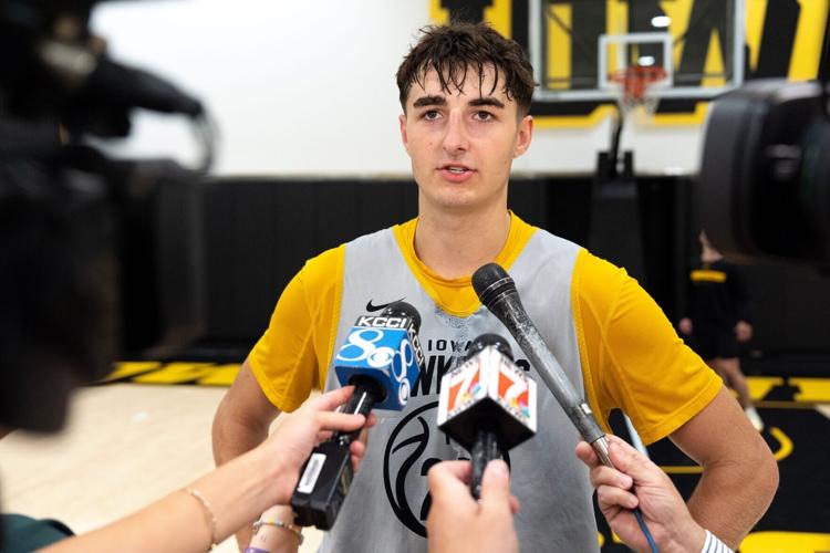 Iowa guard Tate Sage talks to journalists after a summer basketball practice July 8, 2026 at Carver-Hawkeye Arena in Iowa City,