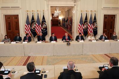 U.S. President Donald Trump speaks during a roundtable discussion on college sports in the East Room of the White House on Friday, March 6, 2026, in Washington, D.C..