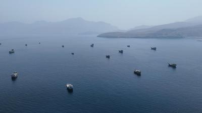 FILE PHOTO: A drone view shows vessels near the Strait of Hormuz, as seen from Musandam