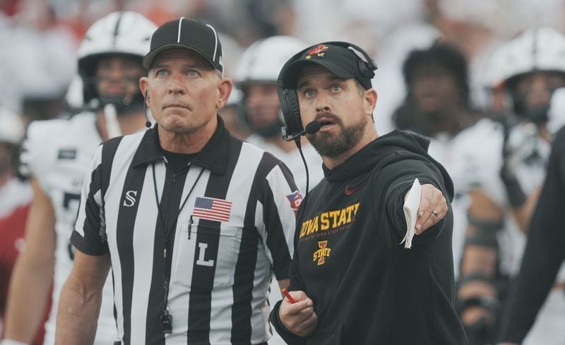 Iowa State coach Jimmy Rogers argues a call with an official during the fourth quarter against Utah on Sept. 26, 2026, at Jack Trice Stadium in Ames, Iowa.