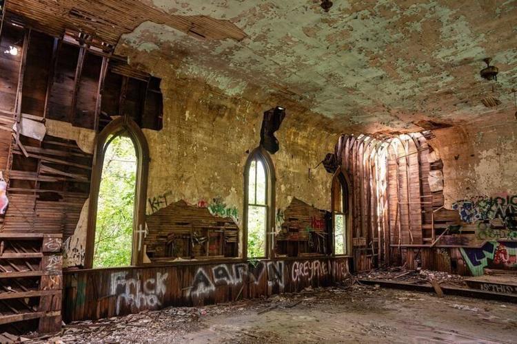 The interior of the abandoned Loucks Grove Church north of Greenfield in rural Adair County.