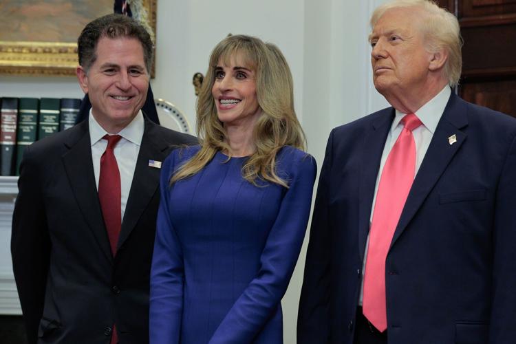 Tech billionaires Michael Dell and Susan Dell join U.S. President Donald Trump to make an announcement about "Trump accounts" in the Roosevelt Room at the White House on Dec. 2, 2025, in Washington, D.C..