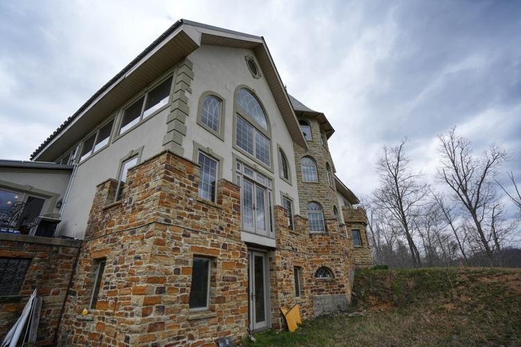 U.S. Rep. Thomas Massie has been building his timber and stone house for more than two decades. He gathered the materials from his 1,500 acre farm, cut the wood into lumber, and hand-chiseled the stones.